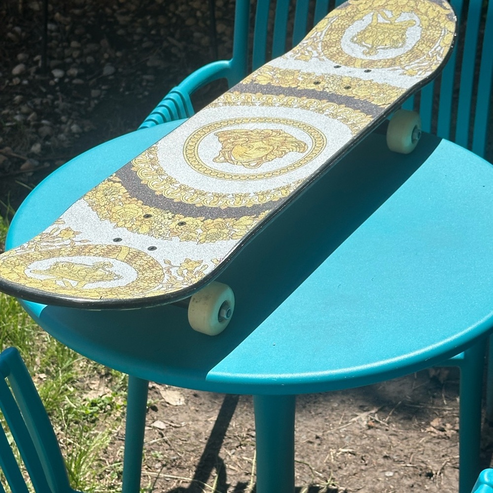 Versace Skateboard with Gold and Black Design